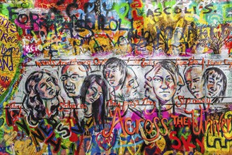 PRAGUE, CZECH REPUBLIC, APRIL 28, 2012: Lennon Wall is filled with John Lennon-inspired graffiti