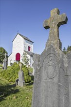 12th century Chapelle Saint-Marguerite and cemetery in the village Ollomont, Houffalize, province