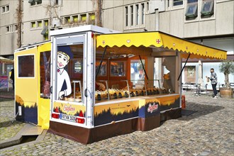 Freiburg, Germany, April 2022: Food truck called 'Stefan's Käsekuchen' selling traditional German