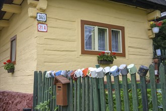 Colourfully painted wooden house in the village of Vlkolinec, Unesco World Heritage Site,