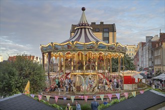 Children's carousel, Dominican market, Jarmark sw. Dominika, Gdansk, Pomeranian Voivodeship,