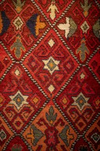 Traditional carpet with pattern, exhibition in the State History Museum, interior view, Bishkek,