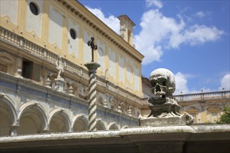 Skulls on the ballustrades in the monks' cemetery, Great Cloister of the Certosa di San Martino on