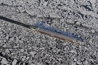 Aerial view of a barge during ice conditions on the Elbe, transport, traffic, weather, climate,