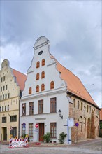 Crooked Baroque gabled house and former warehouse, heritage-protected corner building Am Poeler Tor