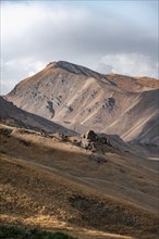 View of mountain landscape with mountain peak at Tyibel Pass, Song Kul Too mountain range, Naryn