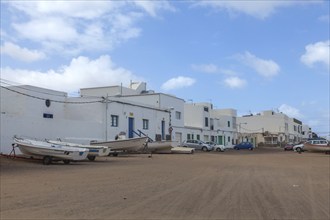 Village street in Caleta de Famara, municipality of Teguise, Lanzarote, Canary Island, Canary