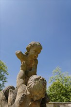 Putti, Putti, group of putti in the castle garden, sculpture, stone sculpture, naked child figure