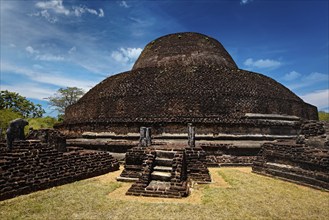 Ancient Buddhist dagoba (stupe) Pabula Vihara. Ancient city of Polonnaruwa, Sri Lanka, Asia