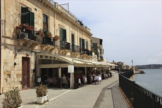 Ortygia or Ortigia is the historic centre of the city of Syracuse, old town house front by the sea,