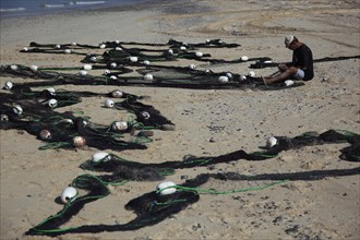 Fishermen on the Arabian Gulf, near Tibat, in the Omani enclave of Musandam, Oman, Asia