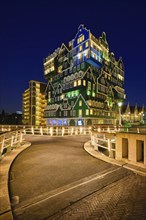 ZAANDAM, NETHERLANDS, MAY 8, 2017: Inntel Hotel in Zaandam illuminated at night. Design of