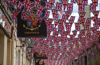 Union Jack flags bunting for Queen's Platinum Jubilee at Trafalgar Tavern, Greenwich, London,