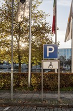 Parking sign for disabled persons, wheelchair users, keep free, consideration, Munich, Germany,