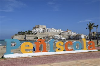 Peñíscola lettering against the backdrop of the old town, Peñíscola, province of Castellón, Costa