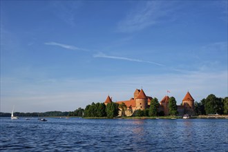 Trakai Island Castle in lake Galve in day, Lithuania. Trakai Castle is one of major tourist