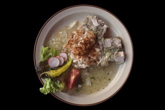 Brawn with onions and fried potatoes on a black background, Bavaria, Germany, Europe