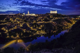 City view of Toledo with the river Tajo, blue hour, province Toledo, region Castilla-La Mancha,