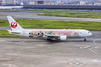 A Boeing 767-300ER aircraft of Japan Airlines JAL with the registration JA614J and the Tokyo Disney