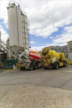 Concrete mixer vehicles in yard, Euromix Concrete, Greenwich, London SE10, England, UK