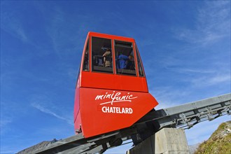 Red carriage of the funicular Minifunic at Châtelard amusement park, Parc d'Attractions du