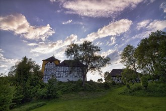 Tonenburg, biker castle, hotel, restaurant and event location, seen from the Weser, backlight,