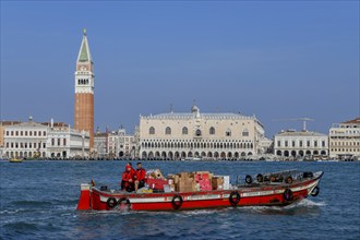 Delivery boat of the parcel service DPD on the Grand Canal in front of the Markusturm and the