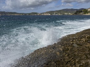 Surf, spray, waves breaking on the rocky coast, behind Peguera, Majorca, Spain, Europe