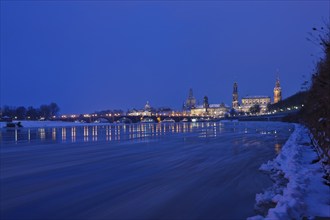 Icy Elbe with old town skyline