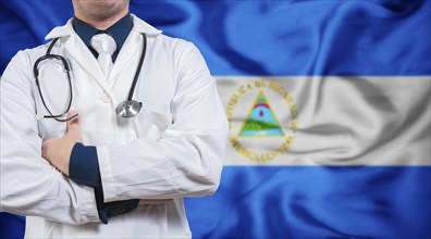 Doctor with stethoscope on flag of Nicaragua. Health and care concept with Nicaragua flag. Doctor