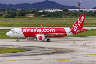 An AirAsia Airbus A320neo aircraft with the registration 9M-AGH at Hanoi Airport, Vietnam, Asia