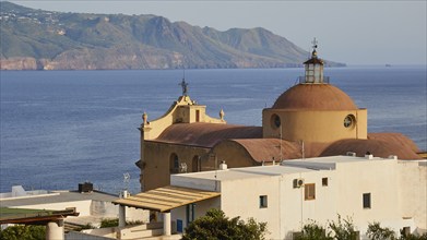 Church building, dome, from behind, sea, coast of Lipari, Santa Marina Salina, Salina, Aeolian