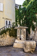 Poets' Square with stone Pi monument, Budva Old Town, Montenegro, Budva, Montenegro, Europe