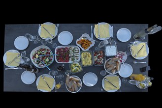 Set table with antipasti and various salads and drinks, Bavaria, Germany, Europe