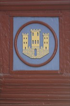 City coat of arms on half-timbered house, wood carving, detail, old town, Limburg, Hesse, Germany,