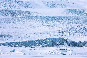 Glacier break in the snowy glacier lagoon Fjallsarlon, Sudurland, Iceland, Europe