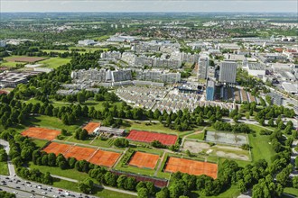 Aerial view of Munich Olympic village and tennis couts from Olympiaturm (Olympic Tower) . Munich,