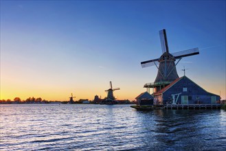 Netherlands rural lanscape, windmills at famous tourist site Zaanse Schans in Holland. Zaandam,