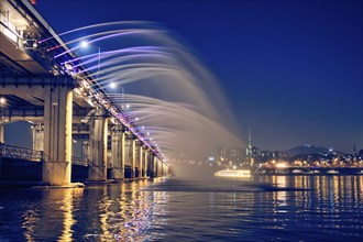 SEOUL, SOUTH KOREA, APRIL 7, 2017: Banpo Bridge Rainbow Fountain tourist landmark on Han river