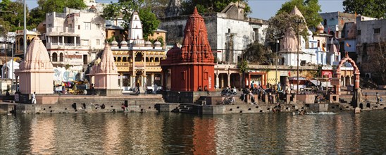 UJJAIN, INDIA, APRIL 24, 2011: People bathing in sacred Rhipra River on ghats of the holy city of