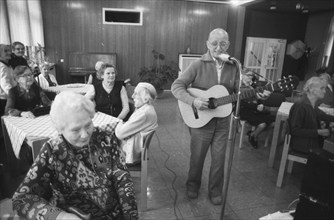 The senior citizens' organisation Grey Panthers entertain residents of a retirement home on 17.03