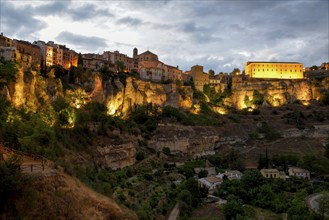 Illuminated Old Town of Cuenca at dusk, Castilla-La Mancha Region, Spain, Europe