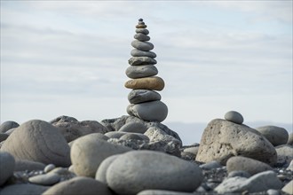 Concept of balance and harmony, pile of stones, beach, sea, Iceland, Europe