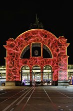 Archway on the station square, light installation at dusk, Lilu, Light Festival 2023, Lucerne,