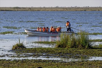 Excursion boat with tourists, at Colonia Carlos Pellegrini, Esteros del Iberá, Corrientes Province,