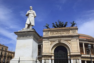 In the old town of Palermo, the Teatro Politeama Garibaldi and the statue of Giuseppe Garibaldi,