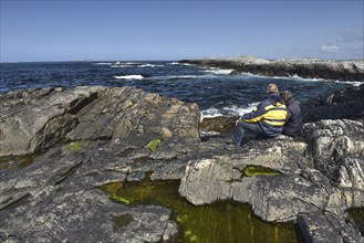 Couple on the Atlantic coast in Norway