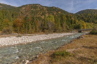 Bridge over the Rißbach in Rißtal, riverbed with scree, Karwendel nature park Park in autumn,