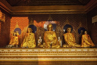 Buddha statues in Burma famous sacred place and tourist attraction landmark, Shwedagon Paya pagoda.