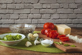 Food photography, making tomato pesto, with tomatoes (Solanum lycopersicum), salt, sunflower